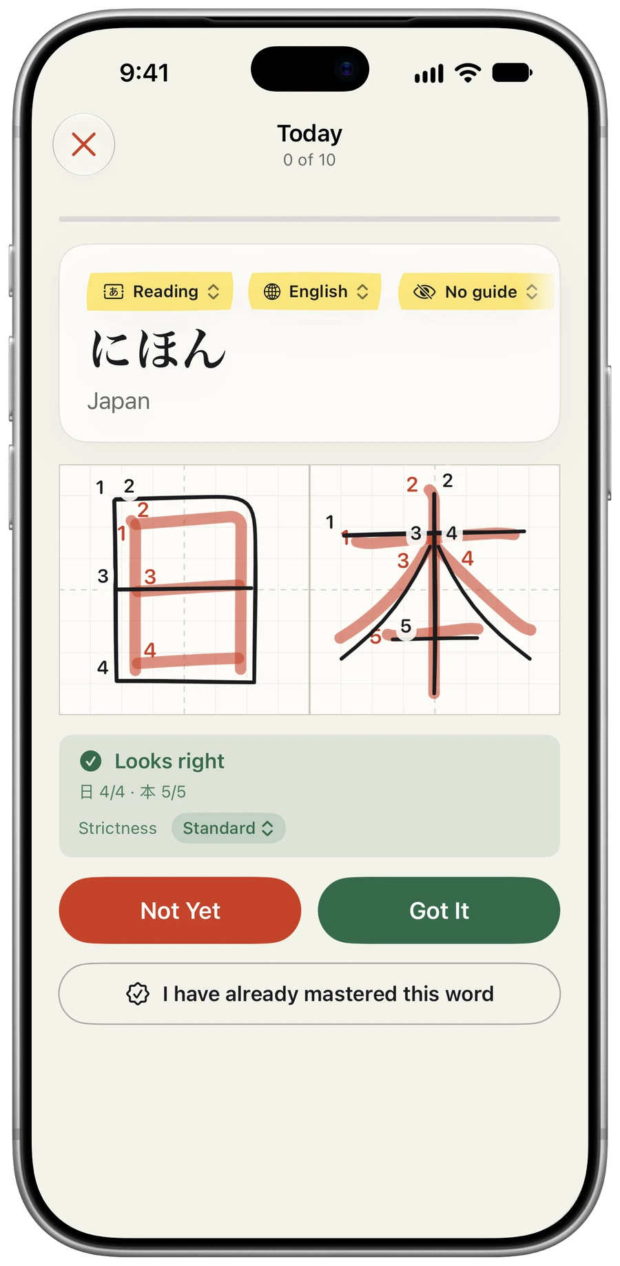 Kaketa on an iPhone after a handwriting check: the reading にほん with the meaning Japan, 日本 written by hand over the correct strokes in red with both numbered, a Looks right verdict, and Not Yet and Got It buttons.